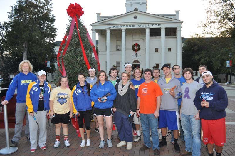 Students set up Limestone Christmas Luminaries