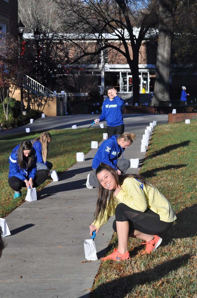 Students set up Limestone Christmas Luminaries
