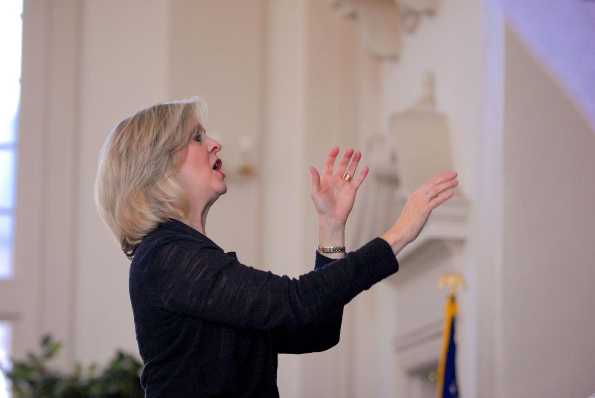 Dr. Poovey leading chorus